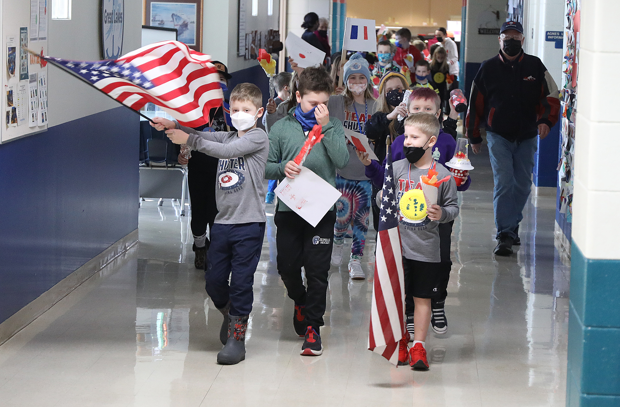Shuster kids lead Olympic parade through school - Vimarsana News