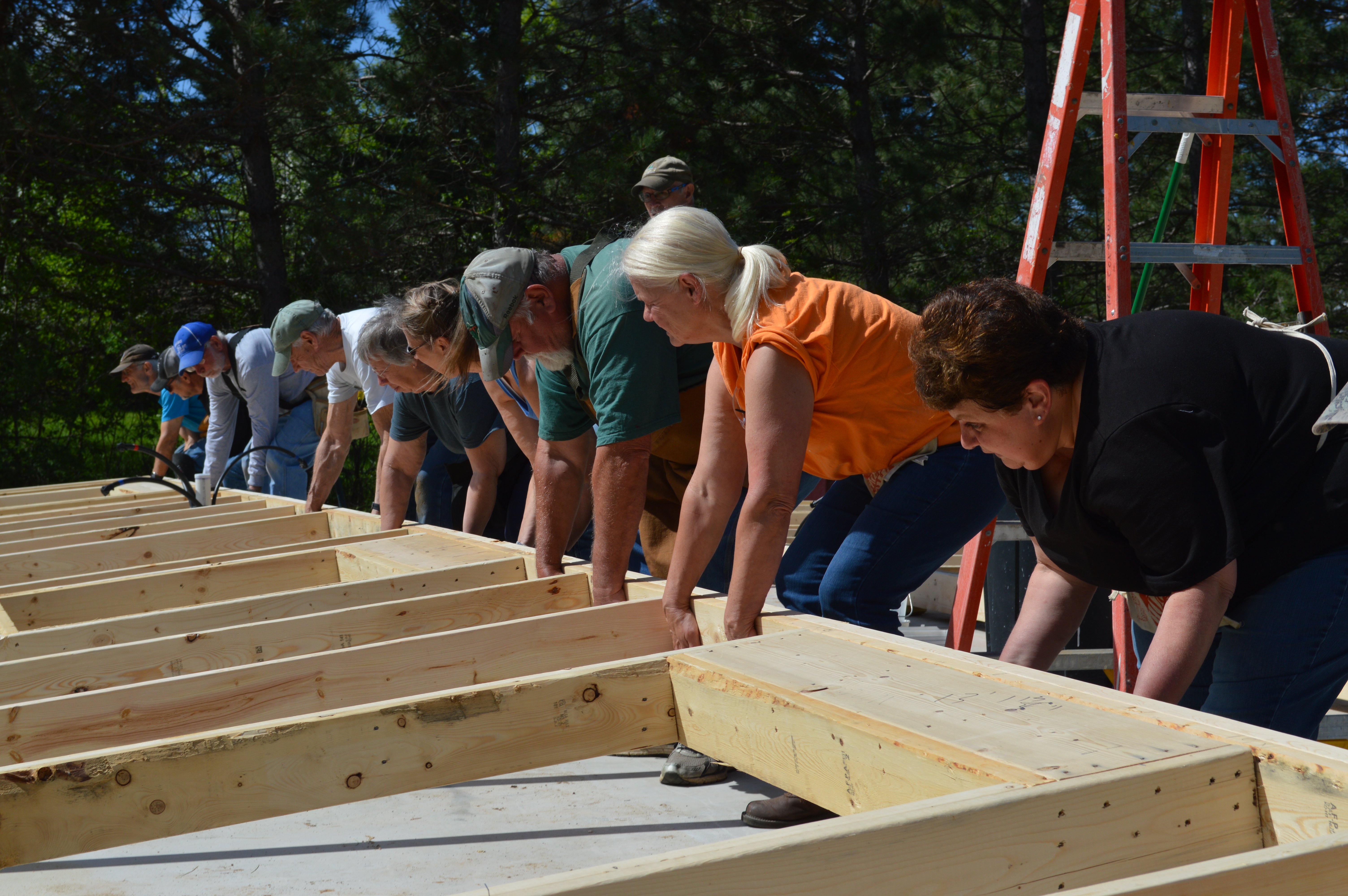 Just in time for the holidays: Lakes Area Habitat for Humanity helps woman own new home - Vimarsana News