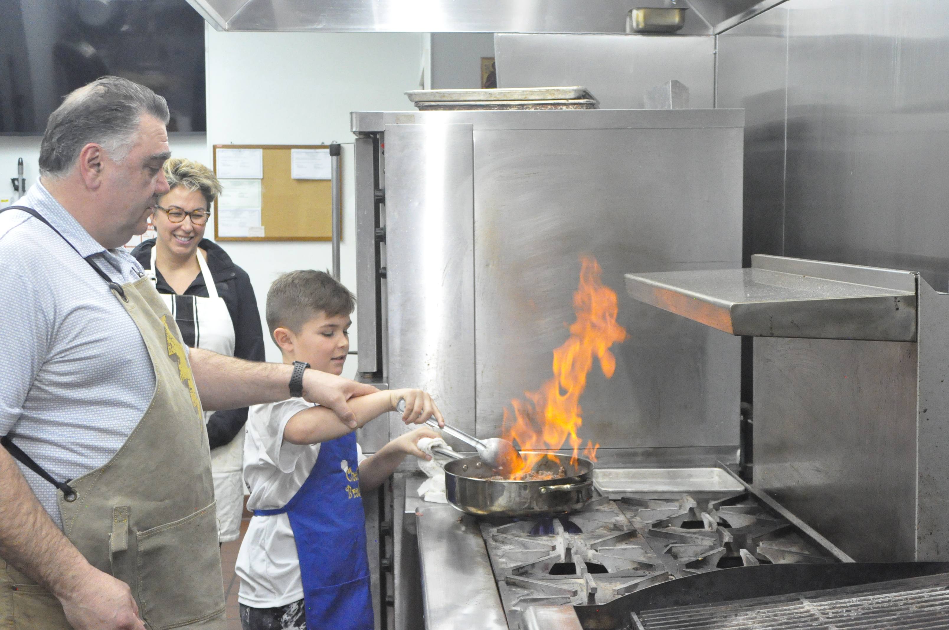 Pine Island boy learns how to cook from Johnny 'Mango' Mangouras at co-op kitchen - Vimarsana News