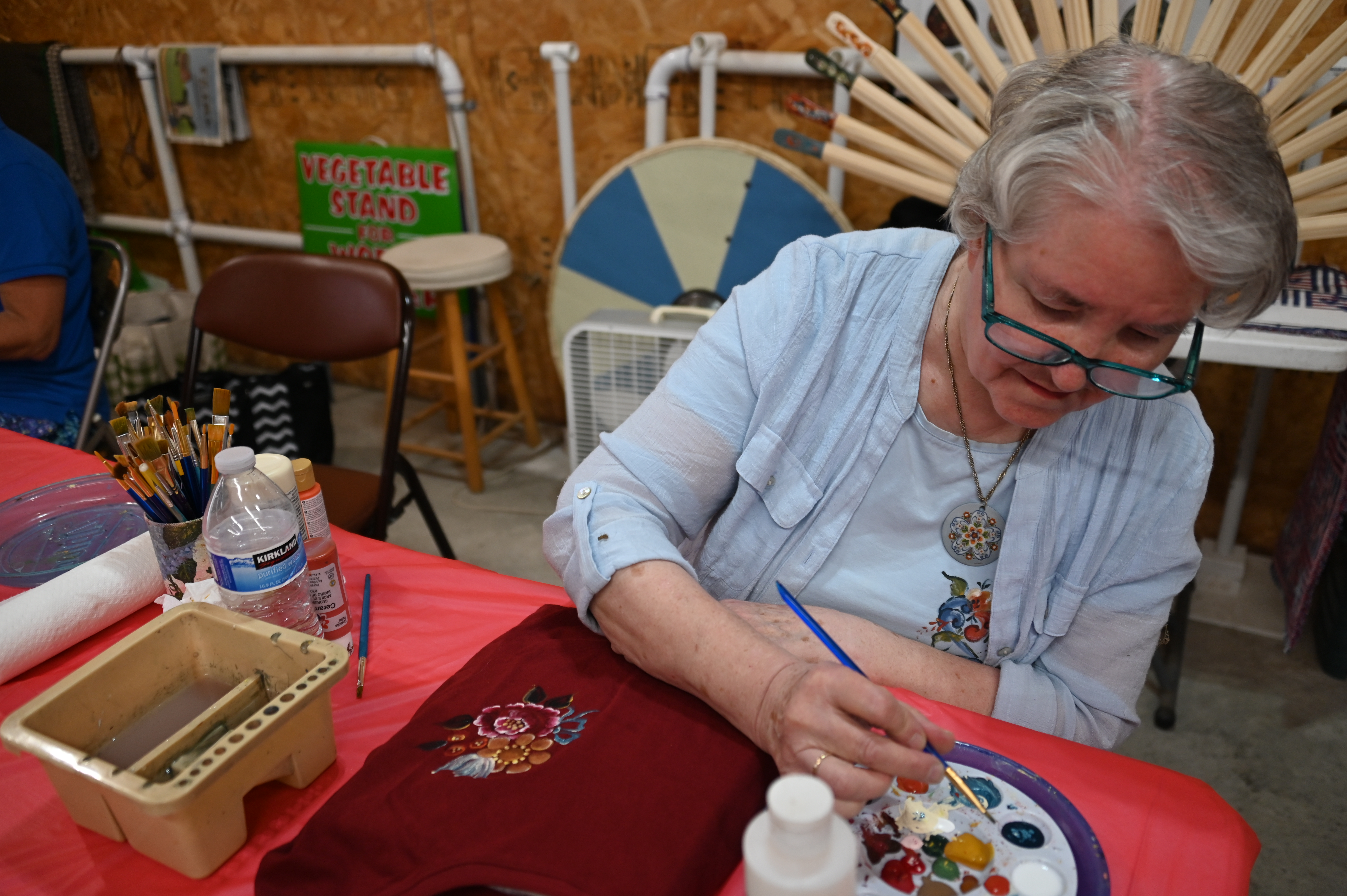 Rejoicing in rosemaling: Traditional painting method makes colorful splash at fair - Vimarsana News