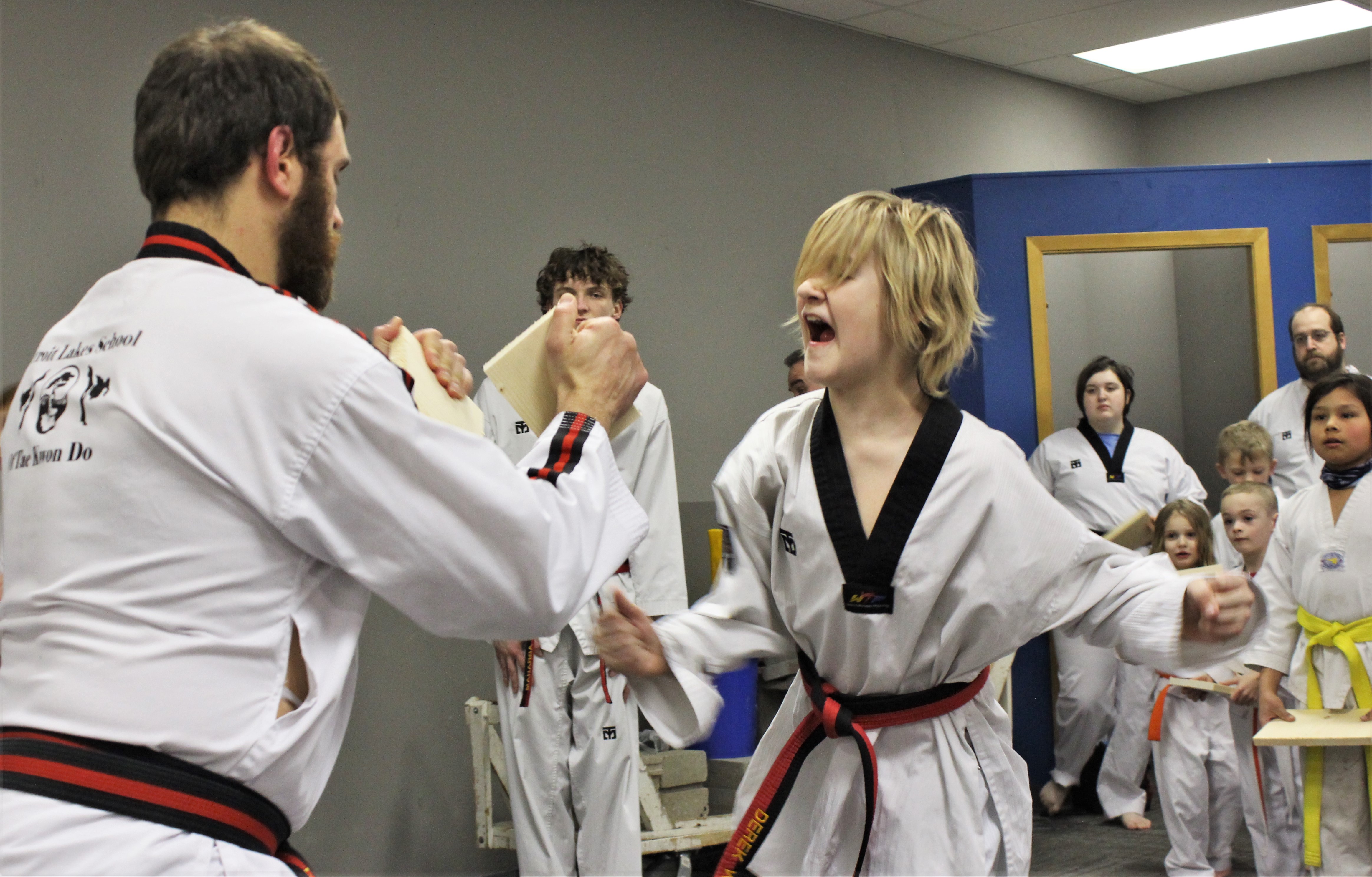 Breaking boards for a good cause: Local tae kwon do students raise money for Becker County Food Pantry - Vimarsana News