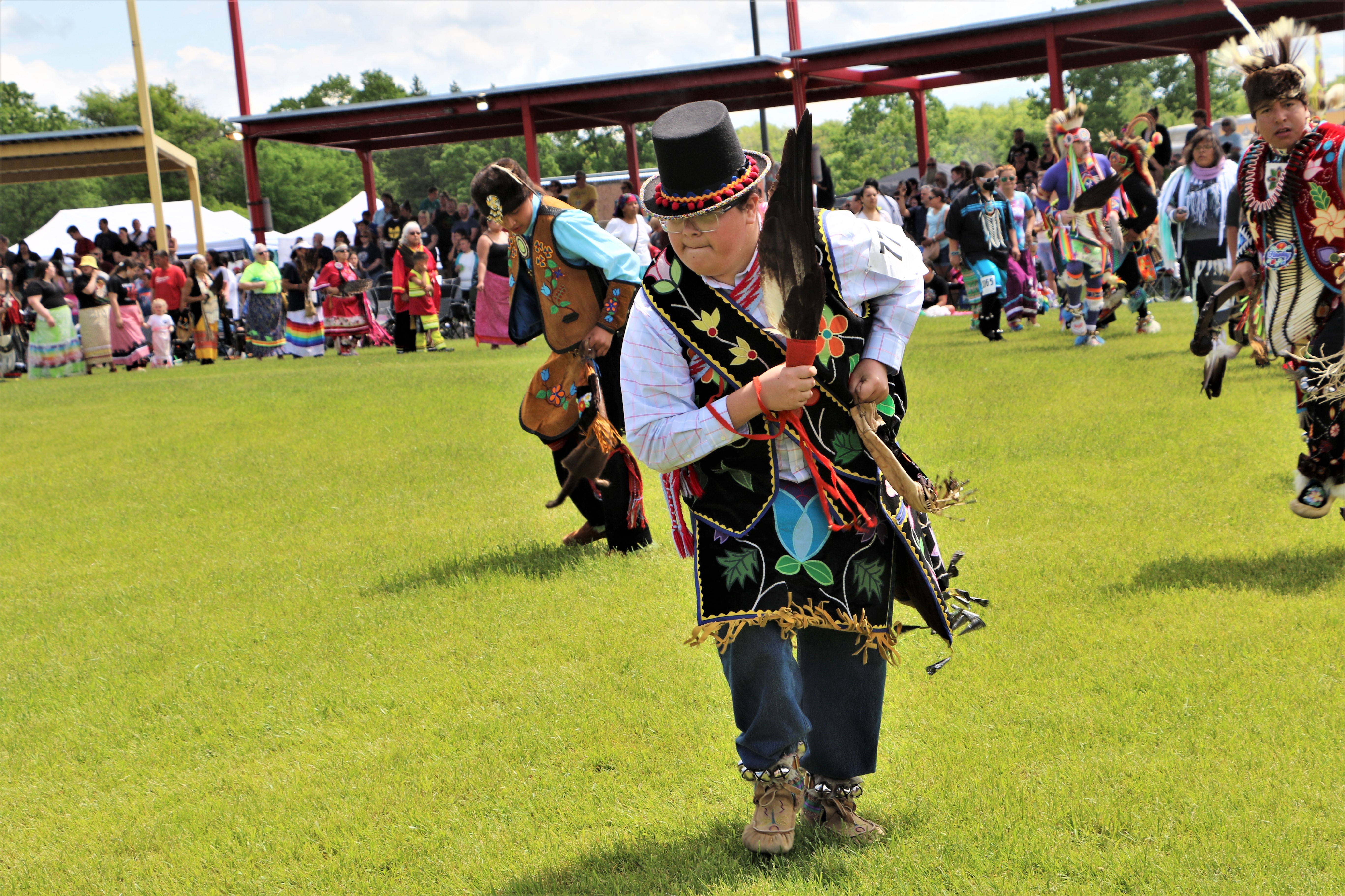 Dancing at a green and sunny powwow - Vimarsana News