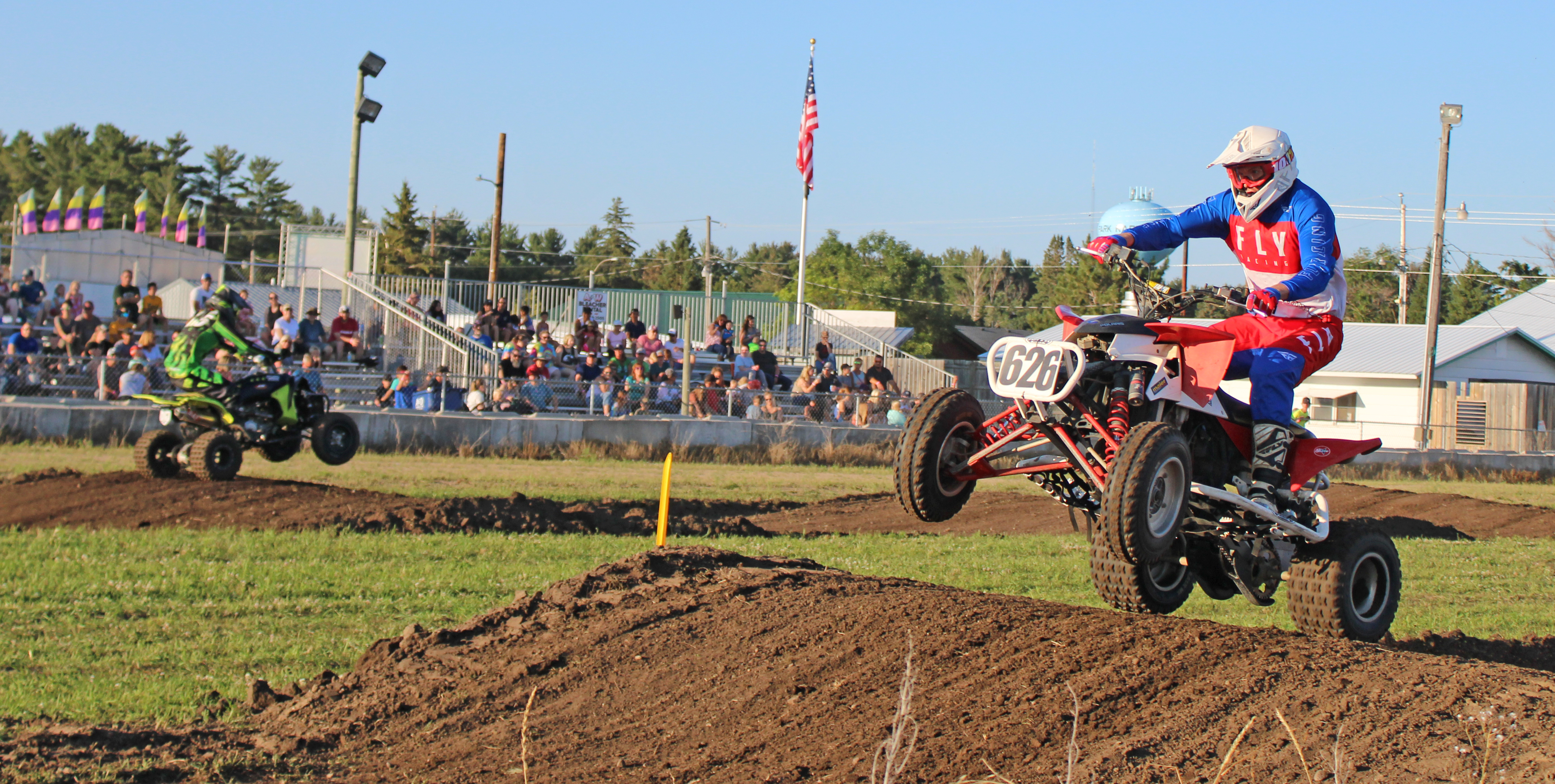 Dirt bikers fly high at county fair grandstand - Vimarsana News