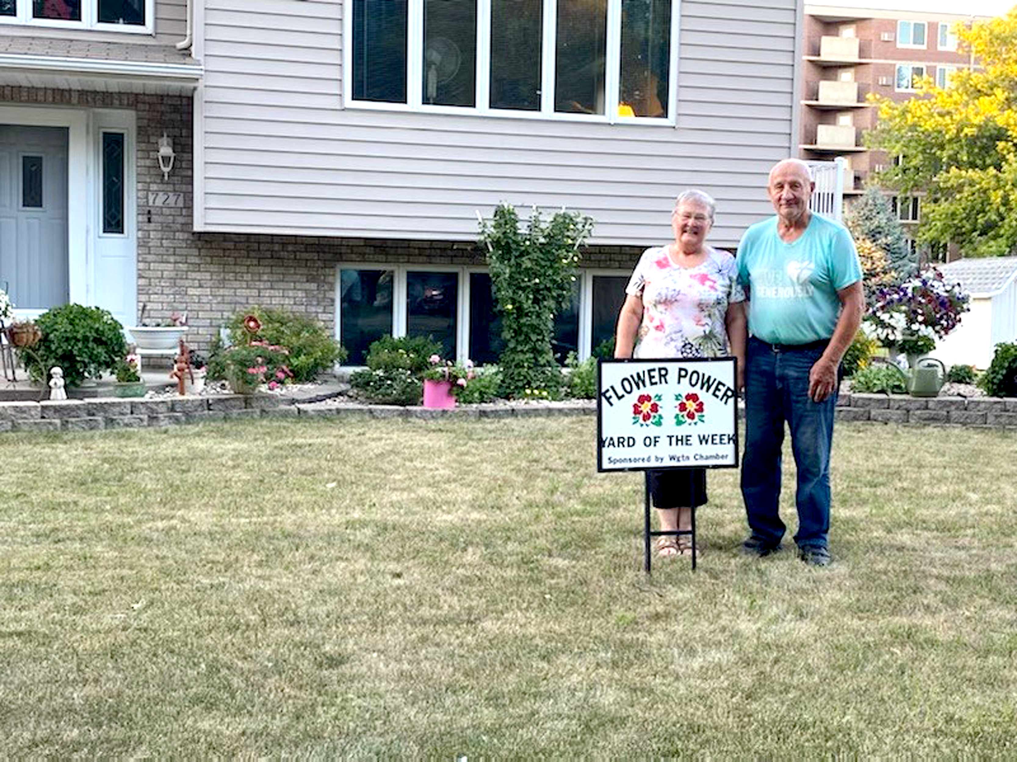 Pomrenkes are Flower Power Yard of the Week honorees - Vimarsana News