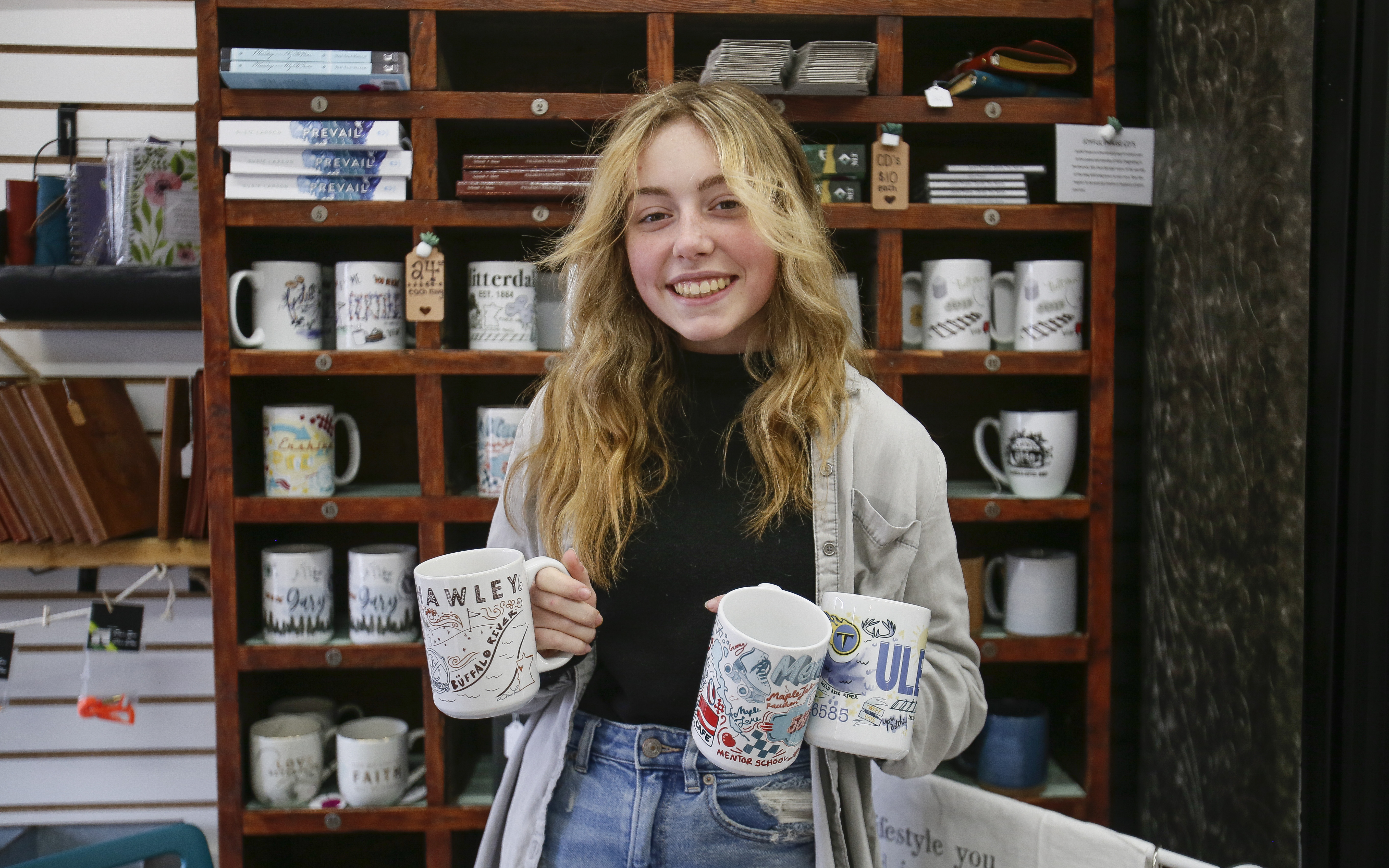 Minnesota teen finds her cup runneth over with demand for her keepsake community mugs - Vimarsana News