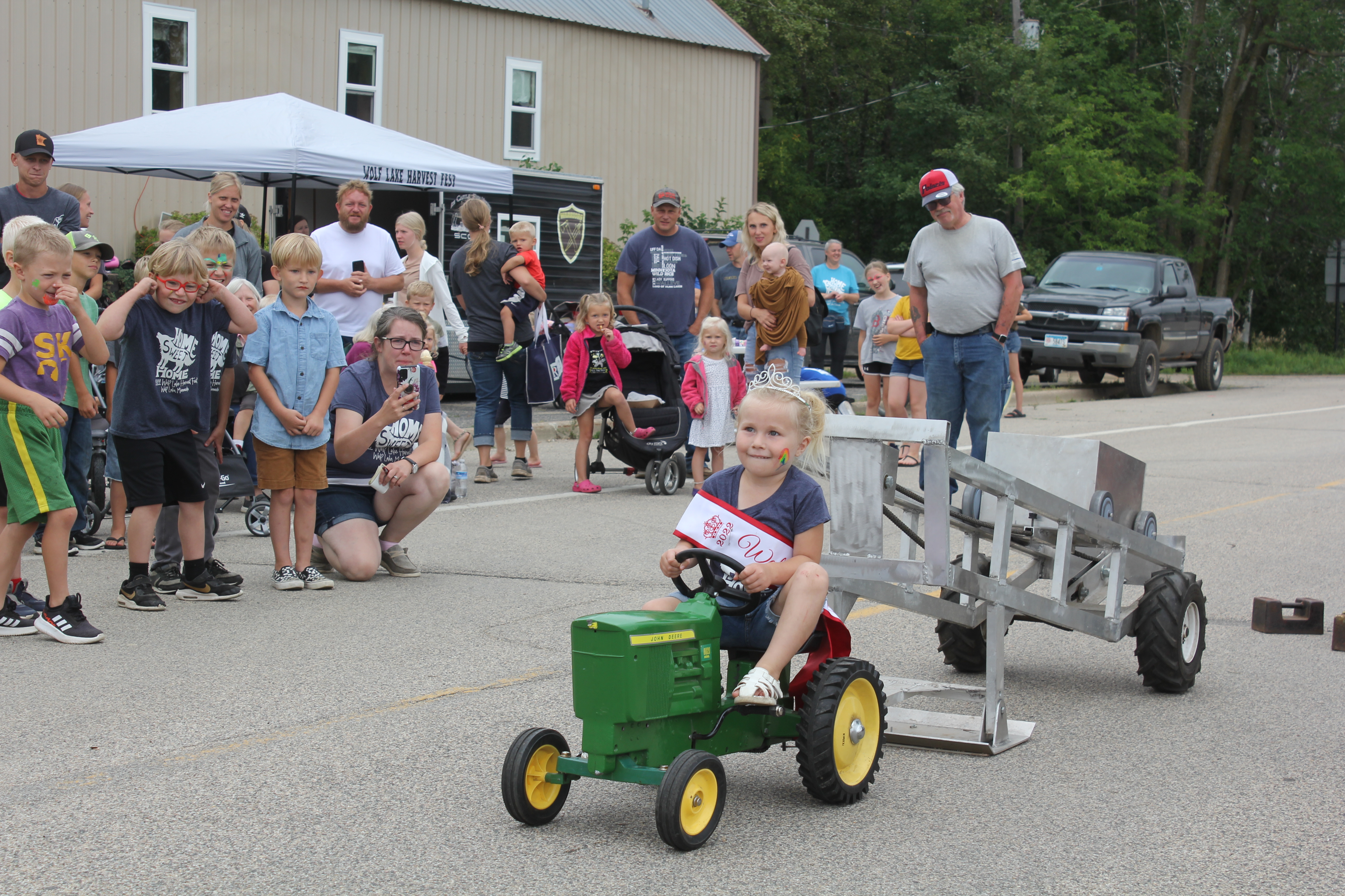 Pedal pushers, pageant winners, painting faces and a parade: Scenes from Wolf Lake's Harvest Festival - Vimarsana News