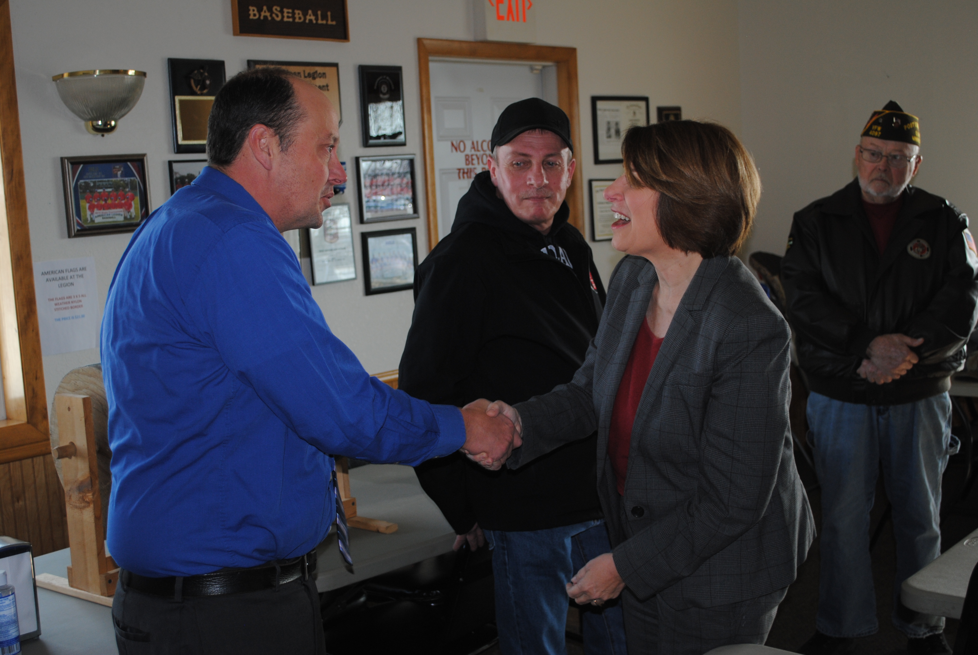 U.S. Sen. Amy Klobuchar visits Olivia, Minnesota, to deliver flag to American Legion, chat with constituents - Vimarsana News